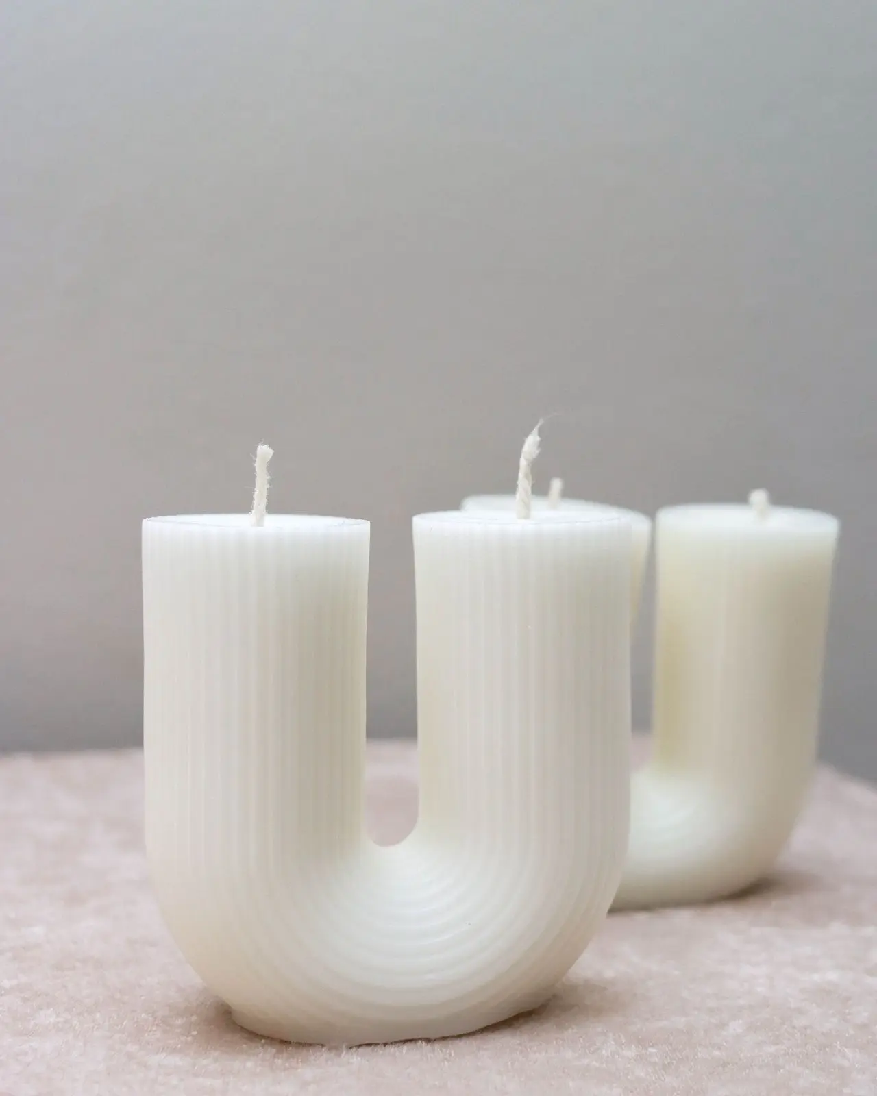 White U-Section-shaped Candles.